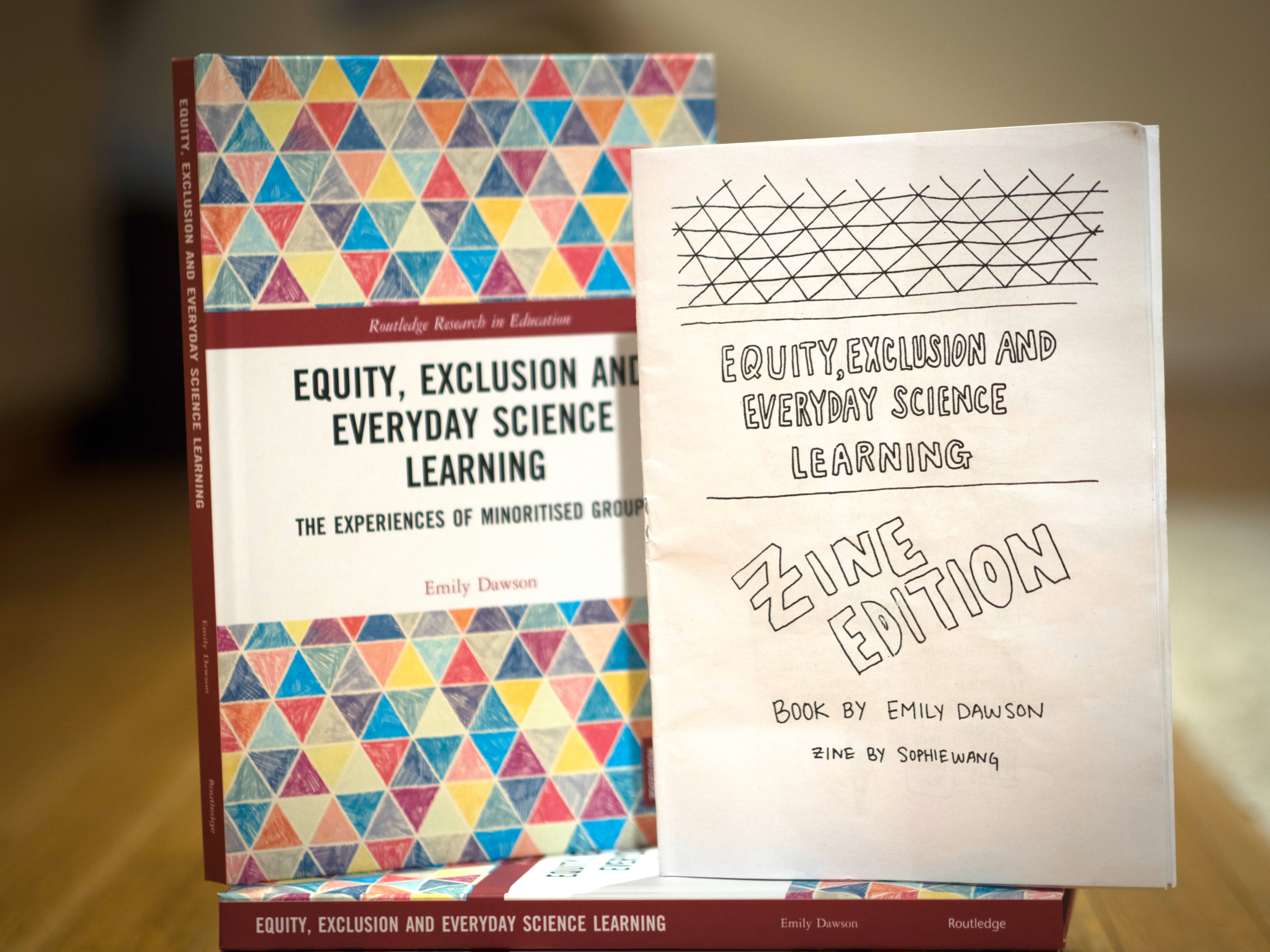 photograph of the front cover of a book on the left with the title equity, exclusion and everyday science learning, next to the front cover of a zine on the right, with the same title